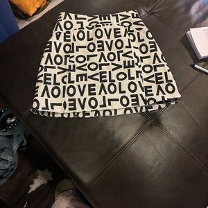 Alice + Olivia Black and Cream Text Print Mini Skirt